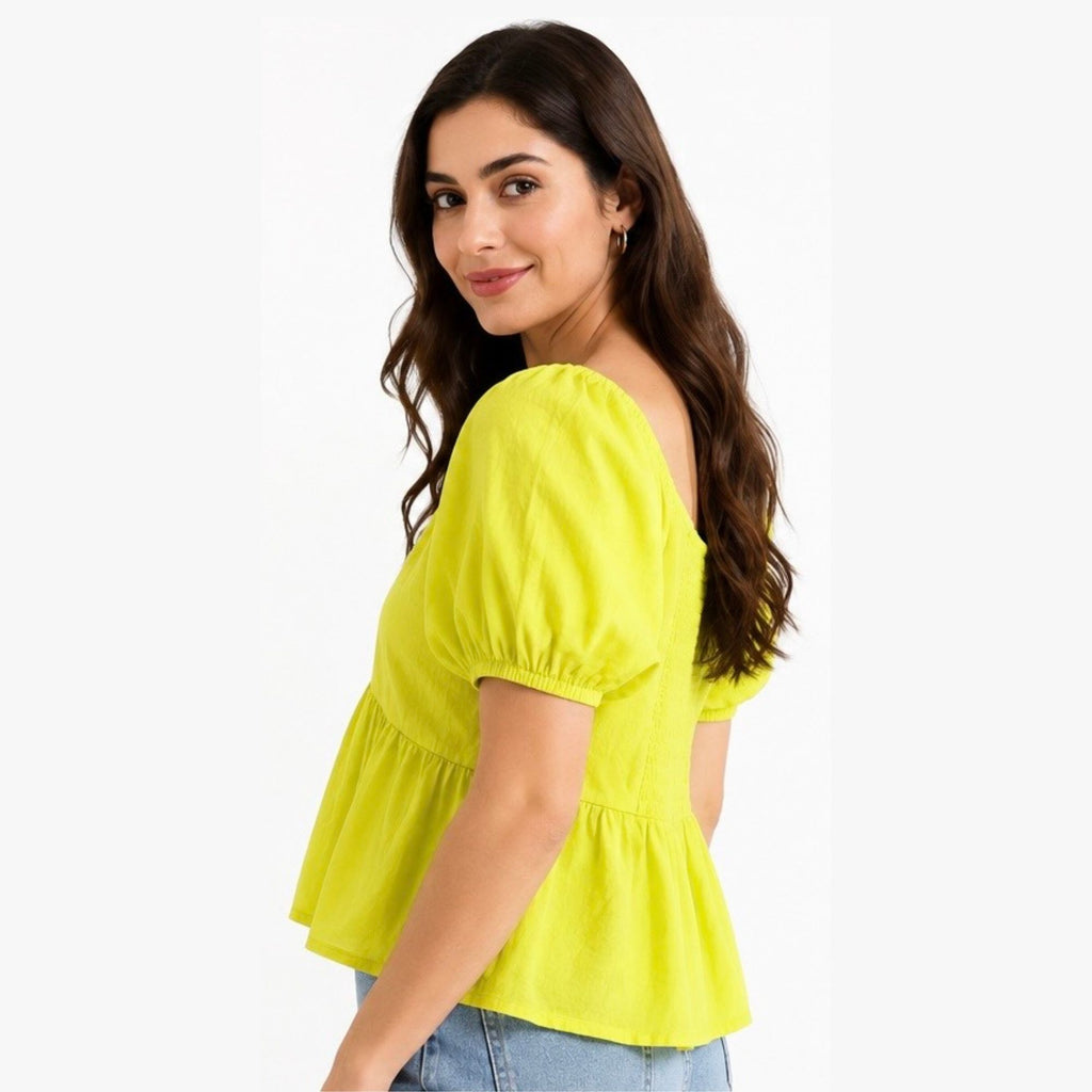 Yellow puff-sleeve peplum top